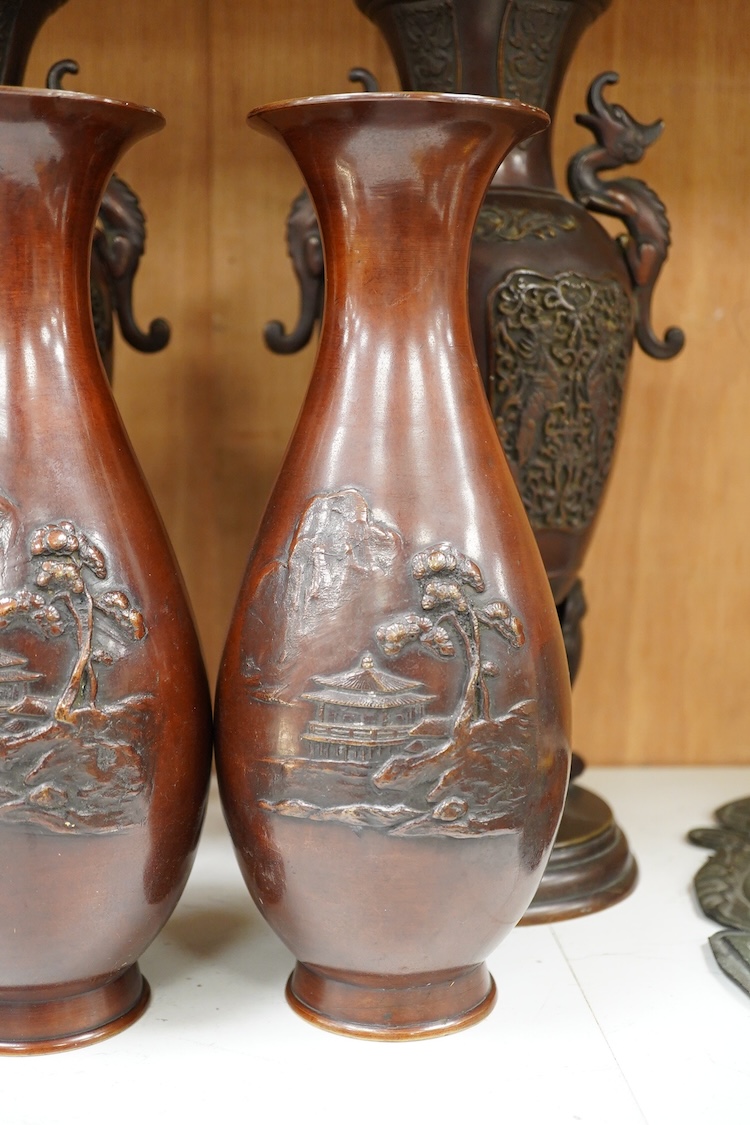 Two pairs of Japanese bronze vases, Meiji period and another, later example, largest 35cm high